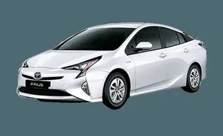 White Toyota Prius hybrid sedan in the Henderson Taxi fleet